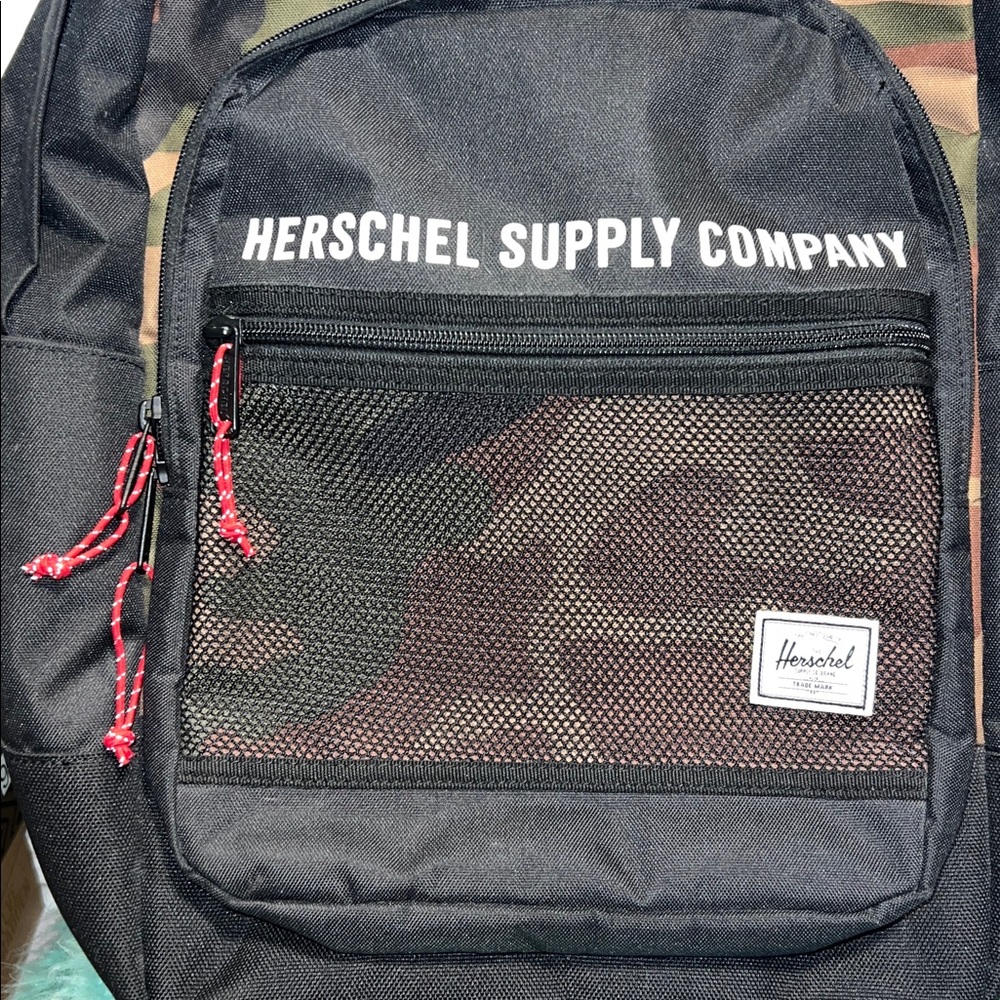 Herschel Supply Company Black and Camouflage Backpack with Red Accents